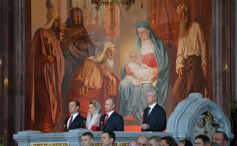 At an Easter service in the Cathedral of Christ the Saviour. With Prime Minister Dmitry Medvedev, his spouse Svetlana Medvedeva and Moscow Mayor Sergei Sobyanin.