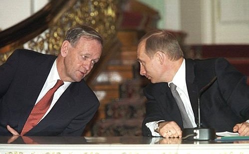 President Putin during a joint news conference with Canadian Prime Minister Jean Chretien following Russian-Canadian negotiations.
