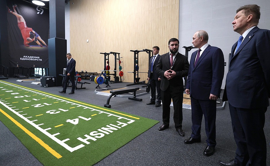 At the Martial Arts Academy, with Olympic judo champion Mansur Isayev (left) and Gazprom Board Chairman Alexei Miller.