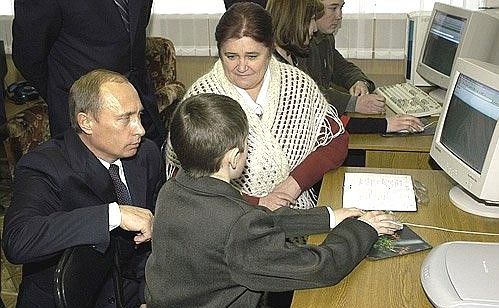 President Putin visiting a model library.