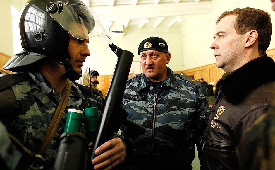 Reviewing military equipment at the Zubr special purpose police unit base.