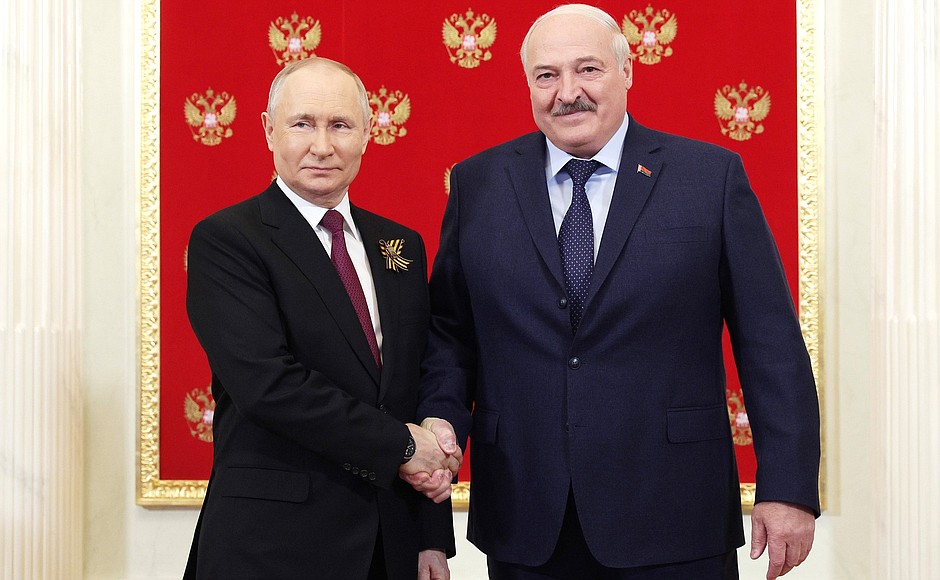 Before the parade, Vladimir Putin welcomed the heads of foreign states who had arrived in Moscow for the celebrations, in the Heraldic Hall of the Kremlin. With President of Belarus Alexander Lukashenko.