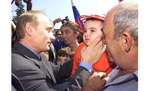 President Vladimir Putin meeting with villagers.