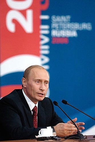 Russia\'s President Vladimir Putin addresses a news briefing at the G8 summit International Media Center.