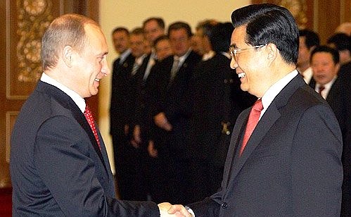With Chinese President Hu Jintao.