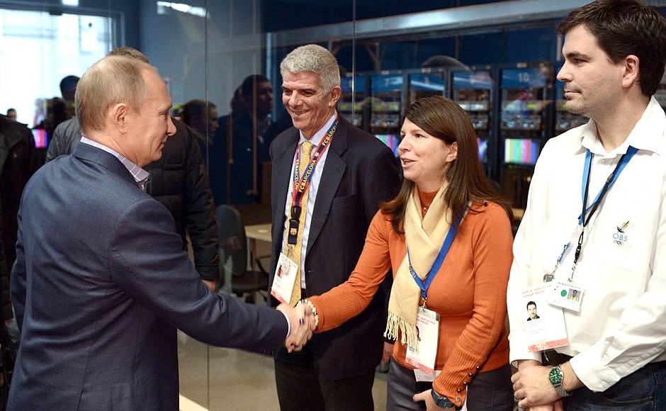 With staff of the Olympic Games’ main media centre.