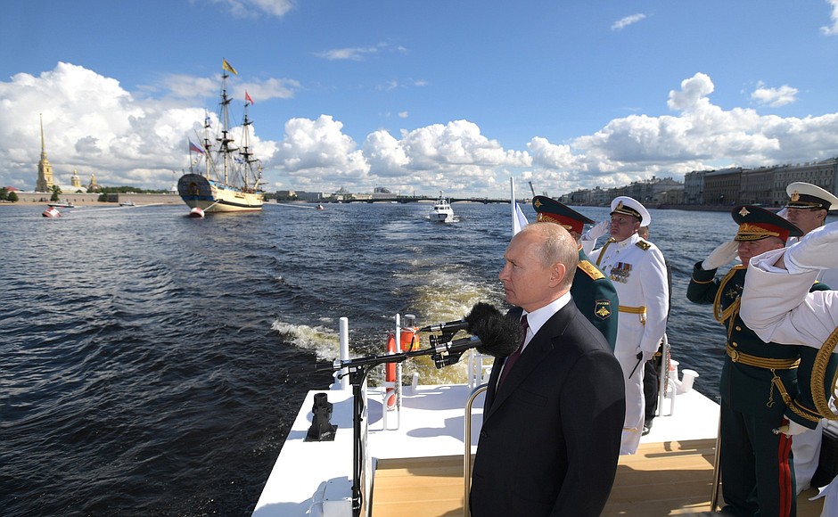 Main Naval Parade. The President having made his rounds of the parade line of Russia’s military ships along the Neva River saluted and congratulated the ships’ crews on Russia Navy Day.