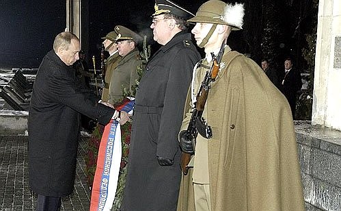 Laying of a wreath by the monument to fallen Soviet soldiers.