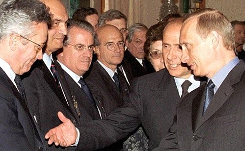 President Vladimir Putin and Italian Prime Minister Silvio Berlusconi during the ceremony of introducing delegations.