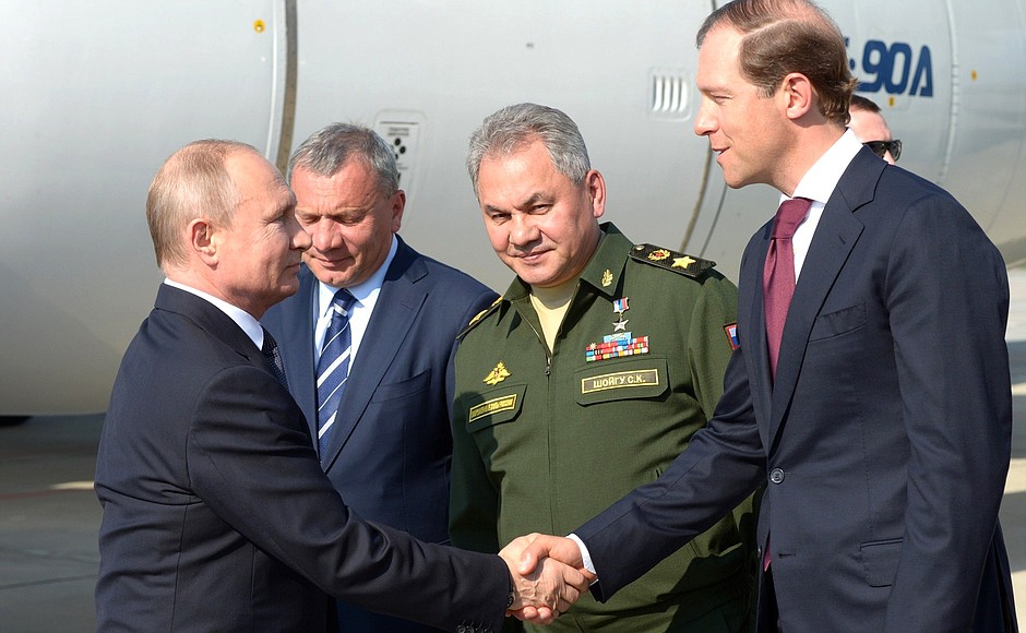 Arriving in Kazan. With Deputy Prime Minister Yury Borisov, Defence Minister Sergei Shoigu (centre) and Industry and Trade Minister Denis Manturov (right).