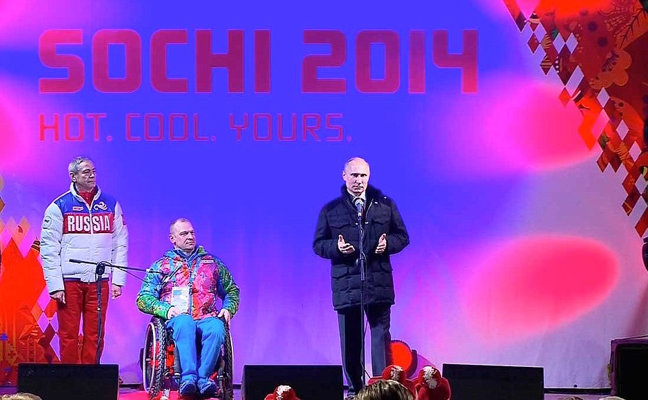 At the Russian Federation flag-raising ceremony at the Paralympic Mountain Village. With Sergei Shilov, mayor of the Paralympic Mountain Village and six-times Paralympics champion, seven-times world champion and four-times European champion in cross-country skiing (centre), and Head of the Russian Paralympics Committee delegation Pavel Rozhkov.
