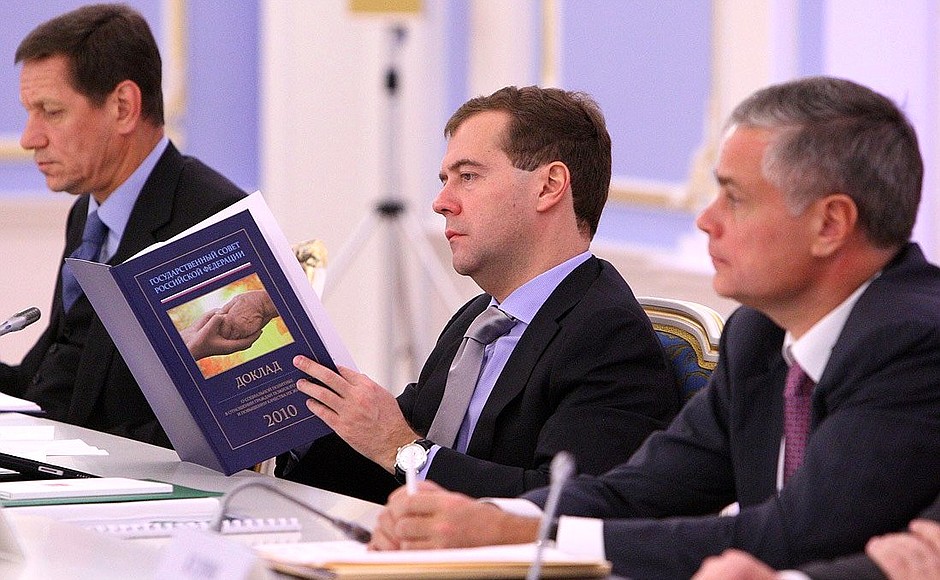At a State Council Presidium meeting on social policy for senior citizens and raising their quality of life. With Presidential Aide Alexander Abramov (right) and Deputy Prime Minister Alexander Zhukov.