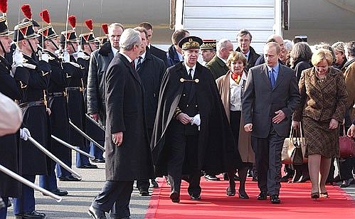 President Putin being welcomed at Bordeaux airport.