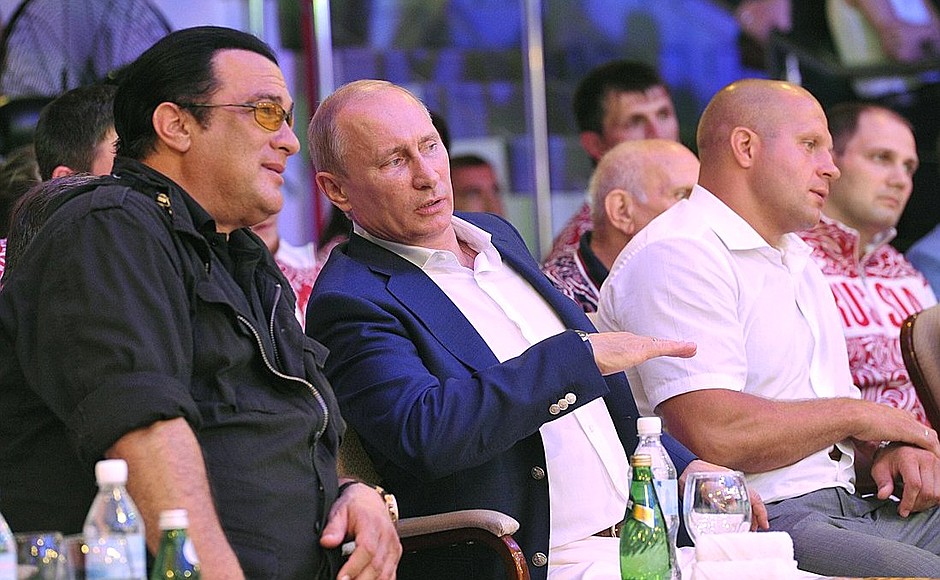 Actor Steven Seagal, Vladimir Putin, and many-times mixed martial arts world champion Fedor Yemelyanenko at Russia’s first mixed martial arts championship.