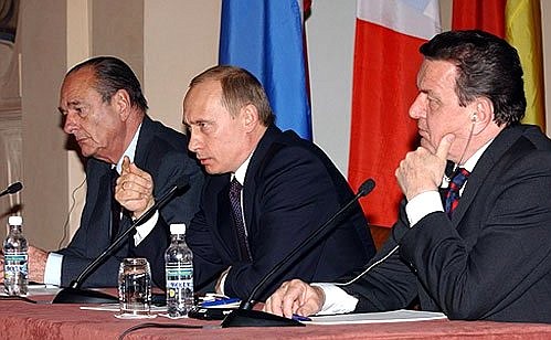 President Putin at a news conference summarising his talks with French President Jacques Chirac and German Federal Chancellor Gerhard Schroeder.