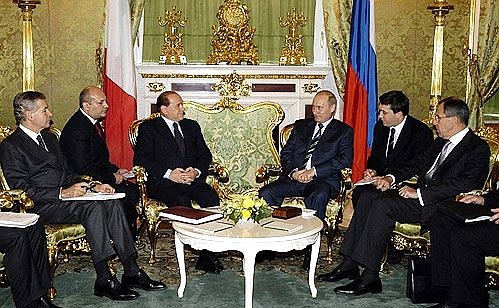 Talks with Italian Prime Minister Silvio Berlusconi.