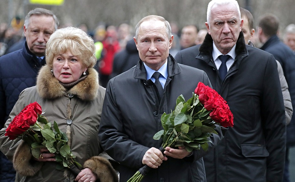 Laying flowers at the monument to Anatoly Sobchak. With Anatoly Sobchak’s widow Lyudmila Narusova.