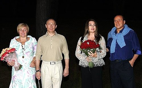 Vladimir and Lyudmila Putin with Silvio and Veronica Berlusconi.