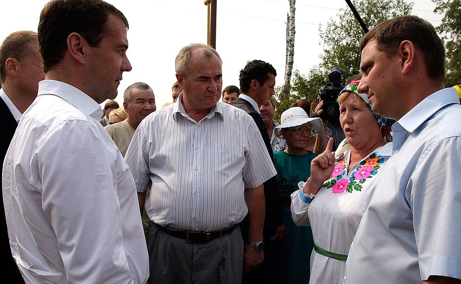 With residents of Maly Shaplak village.