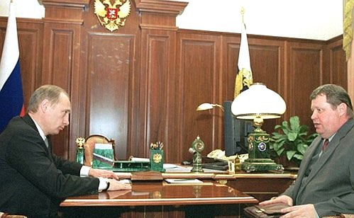 Vladimir Putin with Prosecutor General Vladimir Ustinov.