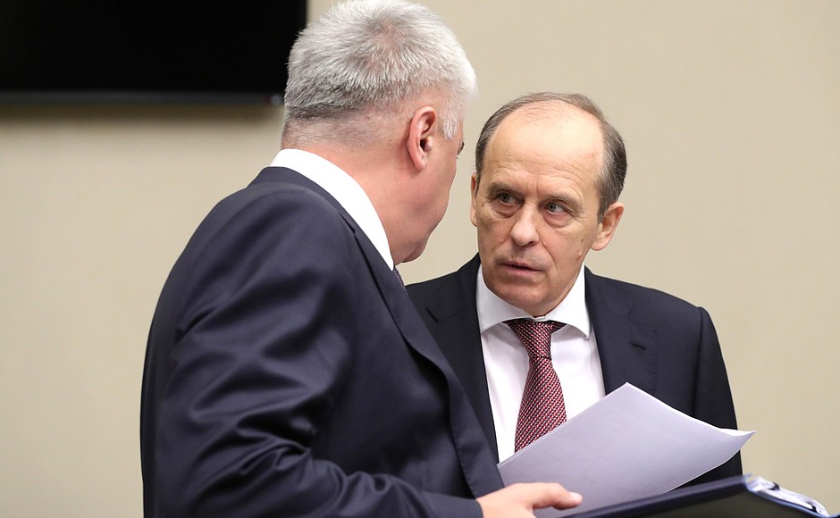 Interior Minister Vladimir Kolokoltsev and Director of the Federal Security Service Alexander Bortnikov (right) before the meeting with permanent members of the Security Council.