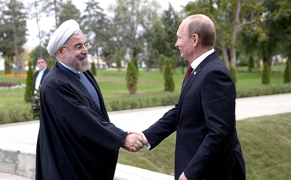 Before the start of the Fourth Caspian Summit. With President of Iran Hassan Rouhani.