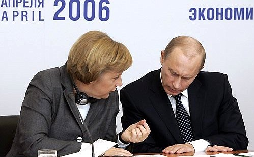 With Federal Chancellor of Germany Angela Merkel at the Russian-German Economic Forum.