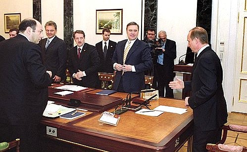 President Putin before a meeting with the Cabinet members.