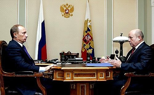Working meeting with Prime Minister Mikhail Fradkov.