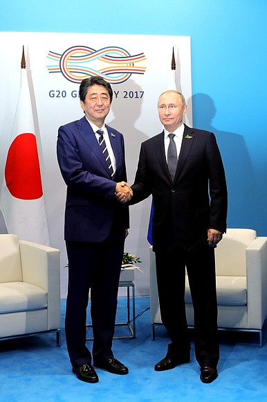 With Japanese Prime Minister Shinzo Abe.