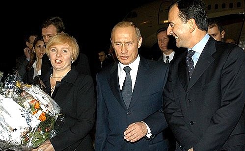 President Putin and his wife, Lyudmila, with Italian Foreign Minister Franco Frattini at the Pratica di Mare Air Force Base outside Rome.