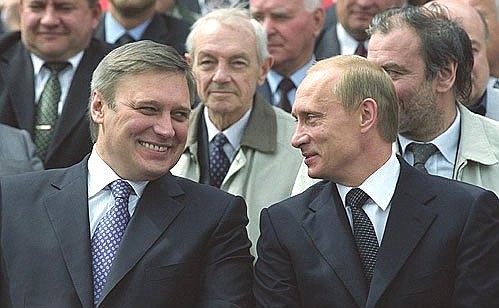 President Putin with Prime Minister Mikhail Kasyanov before the start of Russia Day celebrations.
