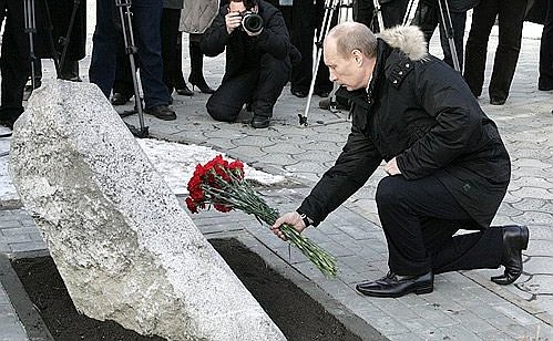 Laying flowers at the memorial to the victims of the 1962 Novocherkassk tragedy.