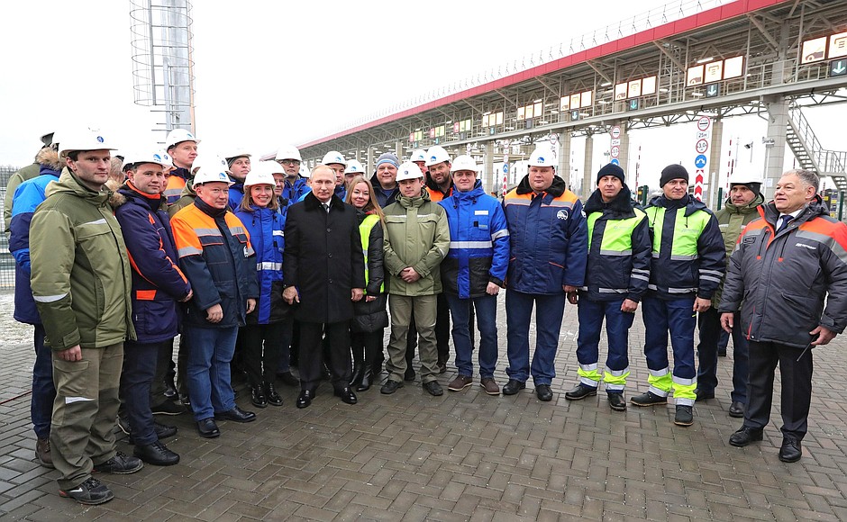 With the construction workers of the M11 Moscow-St Petersburg motorway.