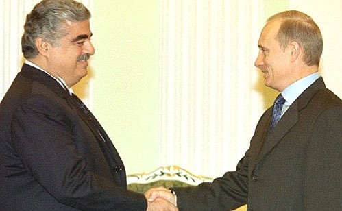 President Putin and Lebanese Prime Minister Rafik Hariri.
