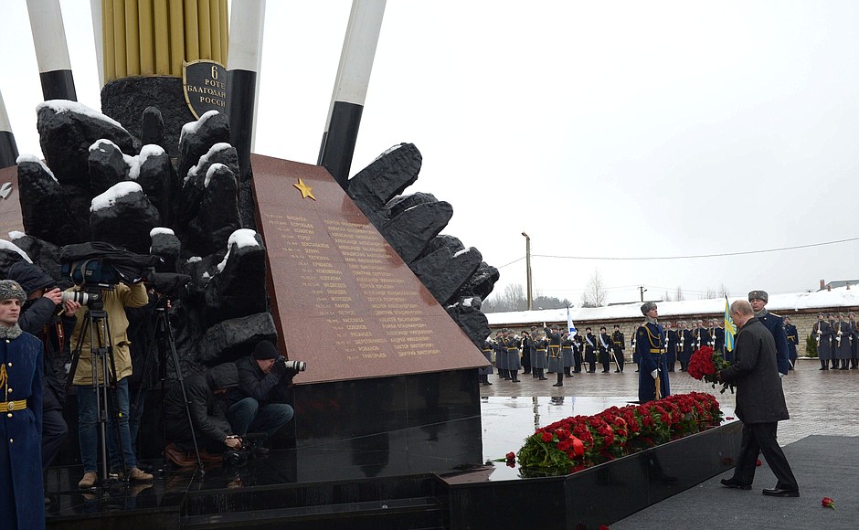 Laying flowers at the monument of the servicemen of the 6th Paratroop Company killed in action.