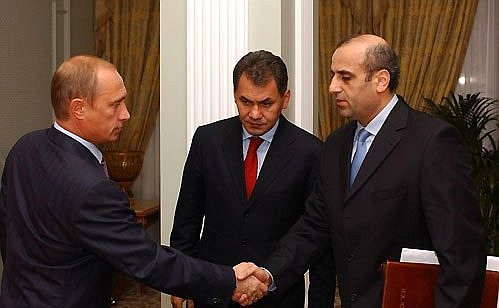 President Putin with Emergency Situations Minister Sergei Shoigu and Energy Minister Igor Yusufov.