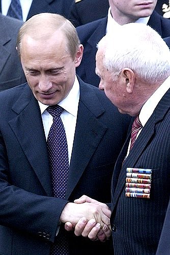 President Putin meeting World War II veterans.