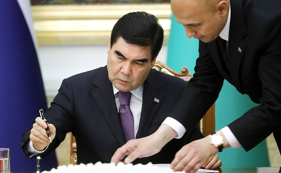 Signing documents following Russia-Turkmenistan talks. President of Turkmenistan Gurbanguly Berdimuhamedov.