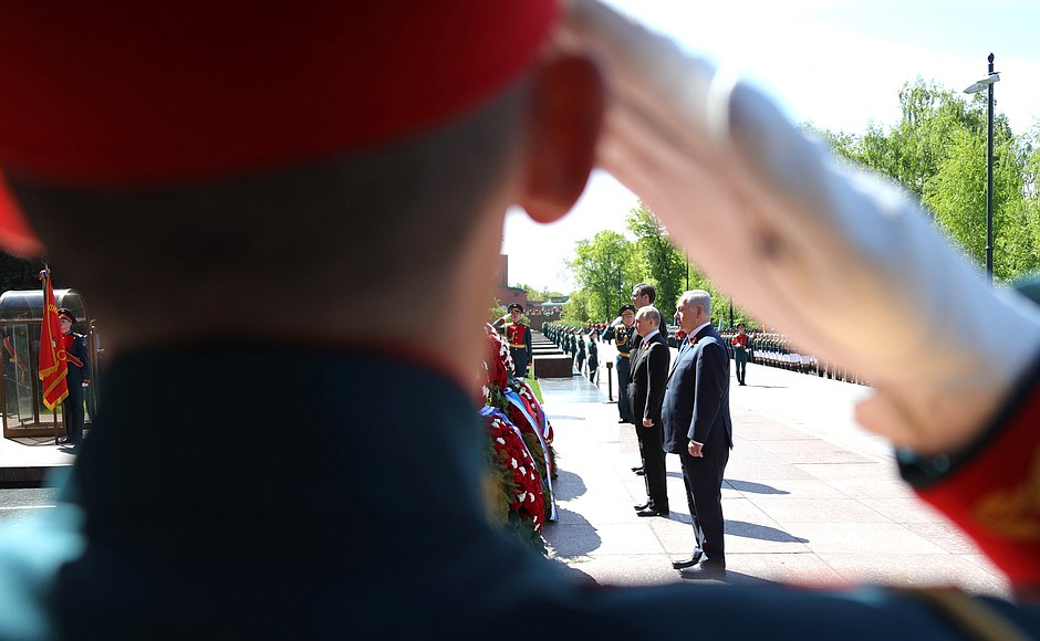 Laying wreath at the Tomb of the Unknown Soldier.