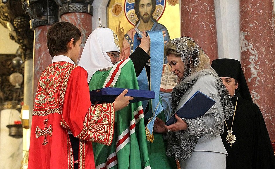 The Naval Cathedral of Saint Nicholas in Kronstadt. Patriarch Kirill of Moscow and All Russia awards the Order of Glory and Honour, I degree to Svetlana Medvedeva.