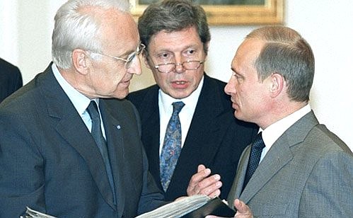 President Putin with Bavarian Prime Minister Dr Edmund Stoiber, who gave Mr Putin two books on Russian history from secret Bavarian archives.