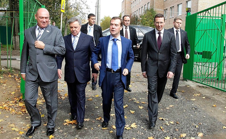 Dmitry Medvedev looked around the yard of one of the town’s residential blocks.