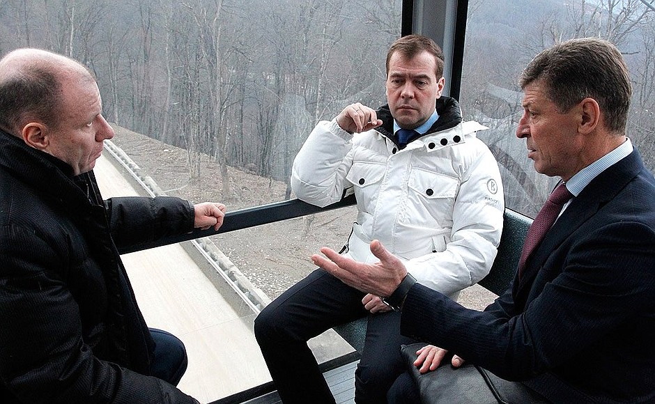 At the Roza Khutor alpine ski resort. With Interros President Vladimir Potanin (left) and Deputy Prime Minister Dmitry Kozak.