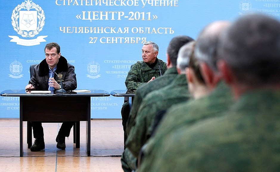 A meeting with commanders of divisions and units of the Armed Forces, Interior Ministry and the Federal Drug Control Service, who took part in the Centre-2011 military exercise. With Chief of Staff and First Deputy Defence Minister Nikolai Makarov (right).