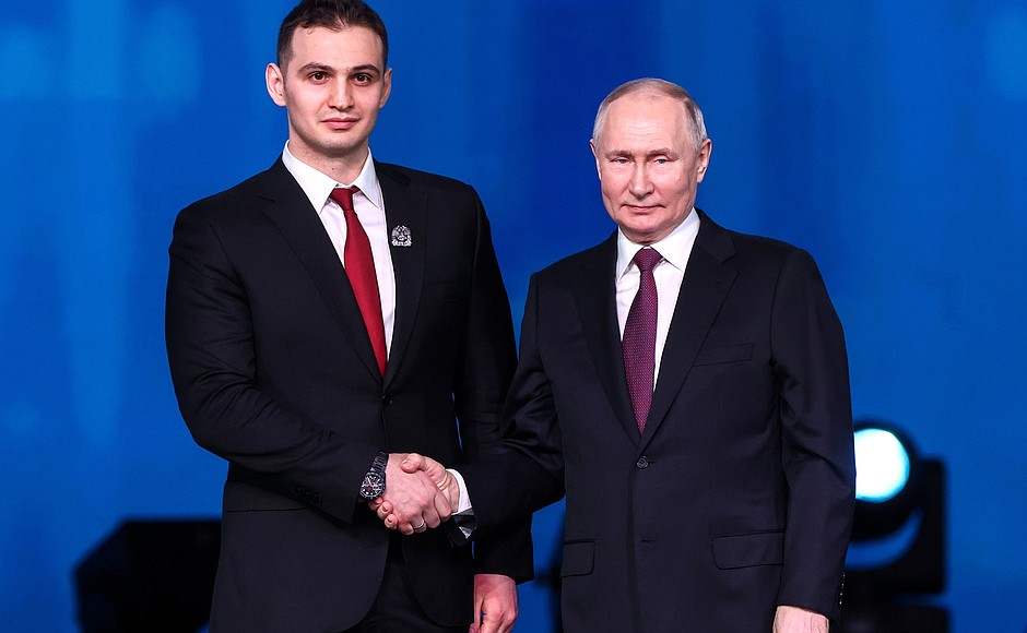 Gala event dedicated to the 300th anniversary of the Russian Academy of Sciences. Vladimir Putin awards the 2023 Presidential Prize in Science and Innovation for Young Scientists to the leading product designer at the Lyulka Experimental Design Bureau, Georgy Gogayev (PhD in Technical Sciences).