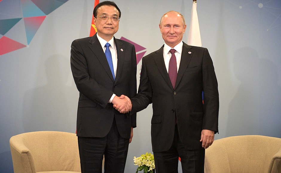 With Premier of the State Council of China Li Keqiang.
