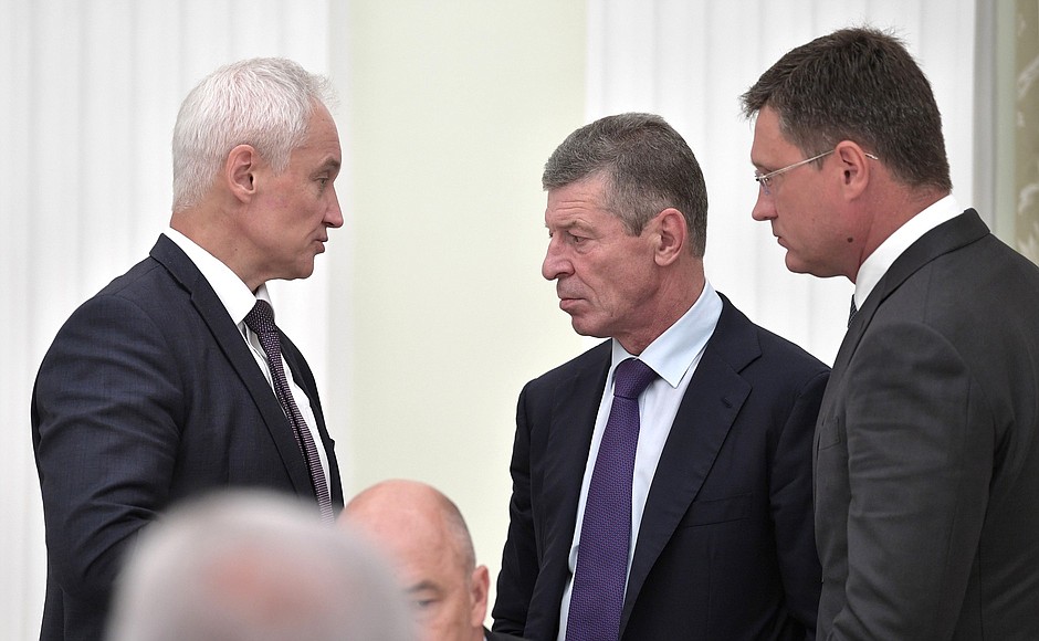 From left: Presidential Aide Andrei Belousov, Deputy Prime Minister Dmitry Kozak and Minister of Energy Alexander Novak before a meeting with heads of coal-mining regions.