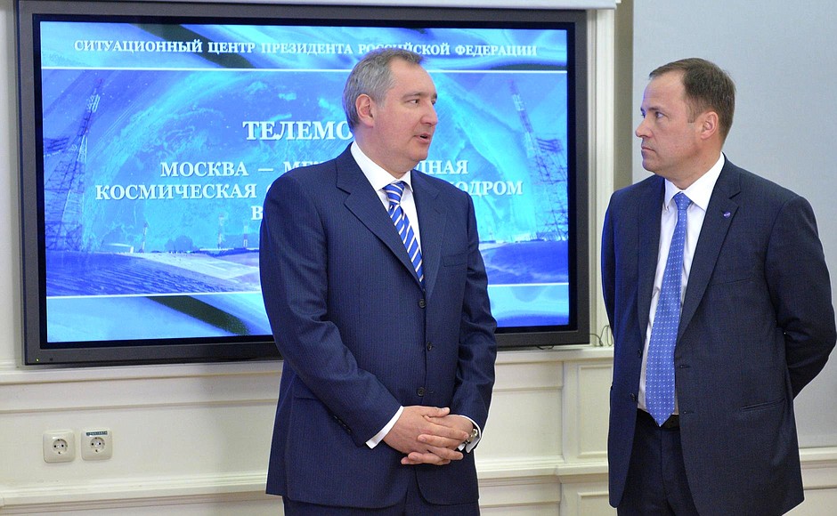 Deputy Prime Minister Dmitry Rogozin and General Director of State Corporation for Space Activities Roscosmos Igor Komarov, right, before a video linkup with the International Space Station and the Vostochny Space Launch Centre.