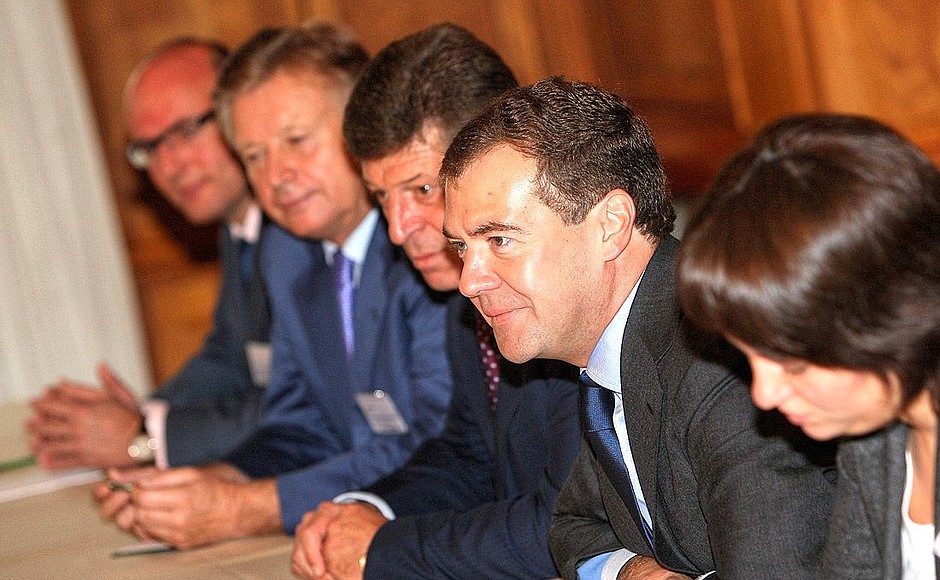 Во время встречи с президентом Международного олимпийского комитета Жаком Рогге.